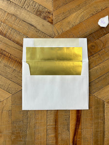 White Envelopes with Gold Lining