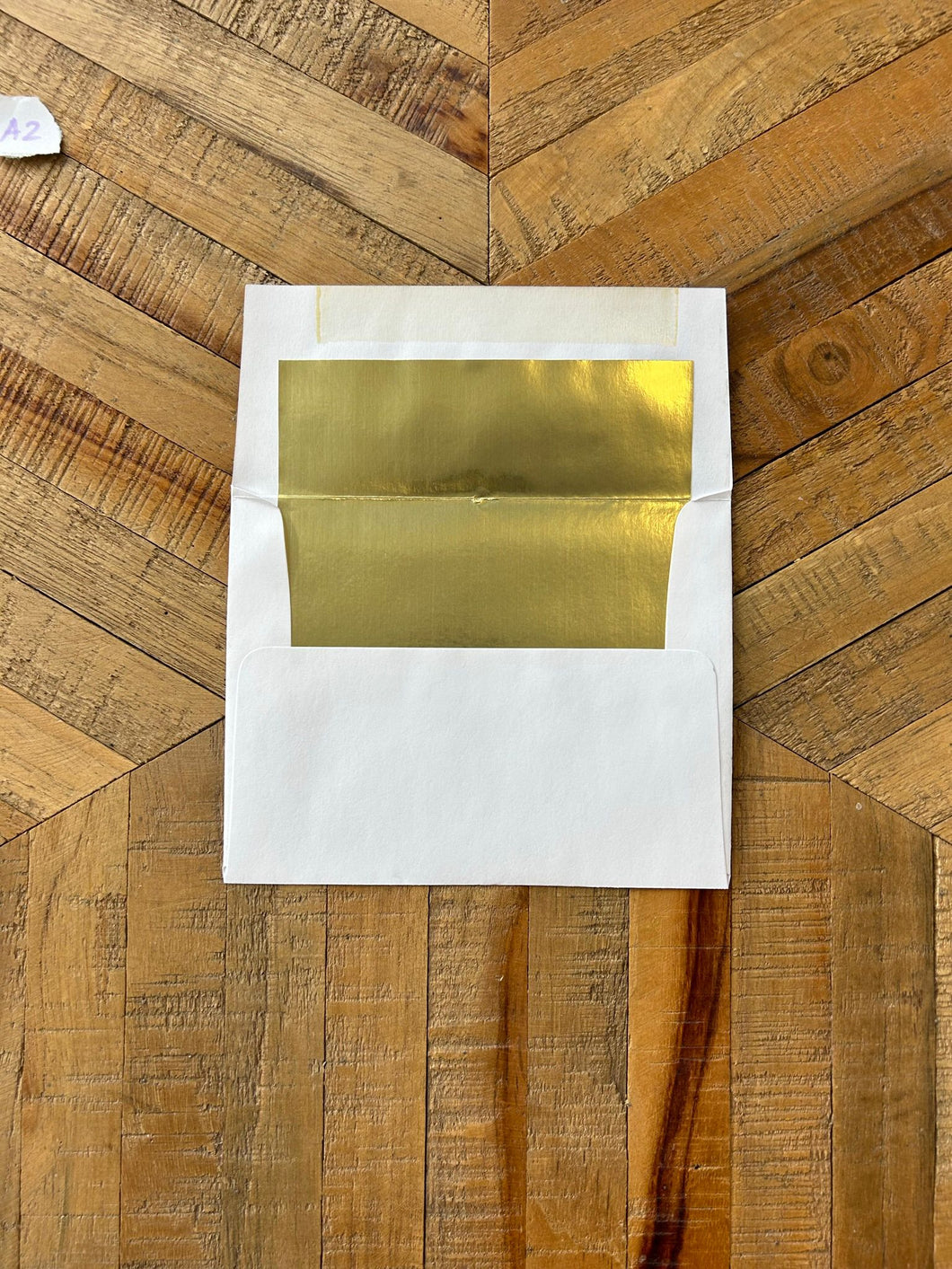 White Envelopes with Gold Lining