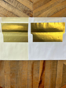 White And Natural Gold Envelopes Comparison