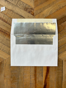 White Envelopes with Silver Lining